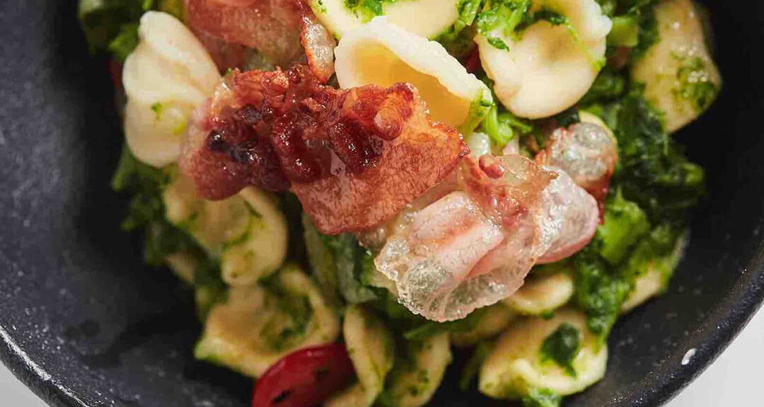 Orecchiette with turnip greens and rolled bacon