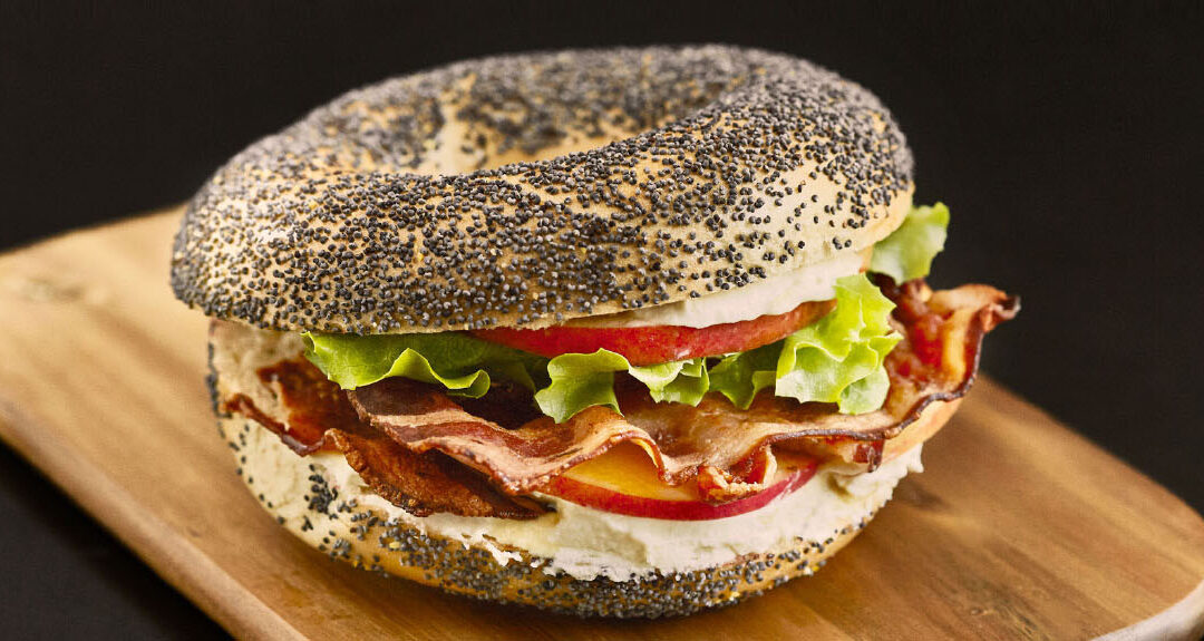 Bagel with bacon, cream cheese and apple