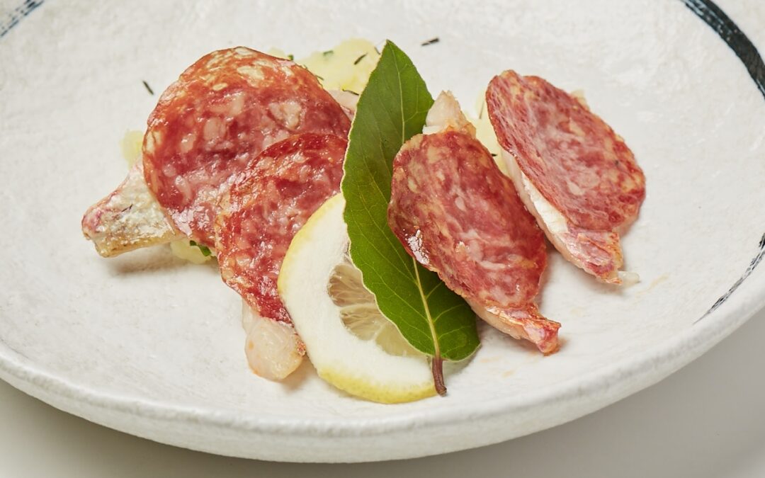 Mullet and salami with boiled potatoes and chives